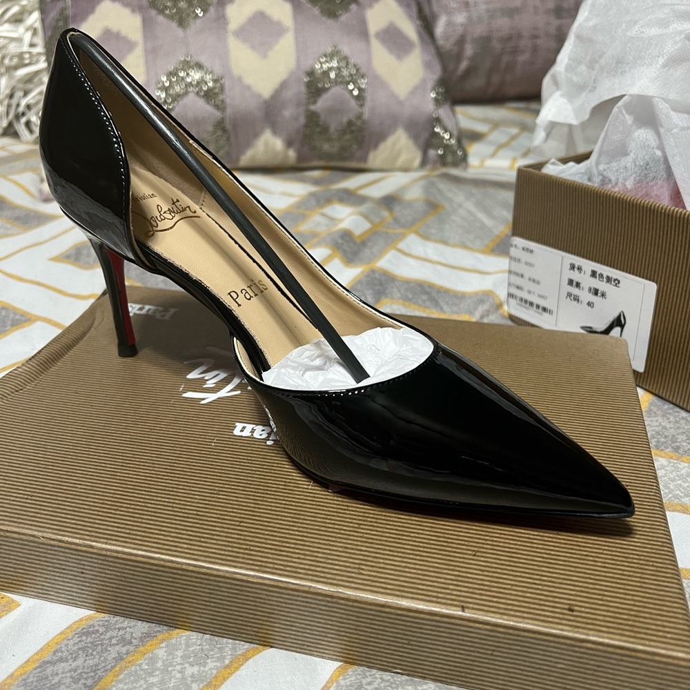 Iriza red bottom heels
